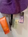 Clinique  purple bag set  (body cream , mini moisture surge lotion,high impact mascara deluxe size , quickliner for eyes intense ,take the day off mini ) 