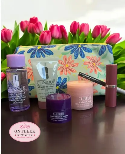 Clinique  Flower Bag Gift Set ( moisture surge cream,  mild liquid facial soap , lip stick in shade plum pop, take the day off makeup remover, intense black eye liner, Smart clinical repair eye cream)